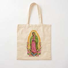 a tote bag with an image of the virgin mary in pink and green on it