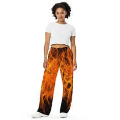 Fire Inferno Pants is the comfort of pajamas in this stylish pair of wide-leg pants. With the adjustable waist and stretchy fabric, it's like your favorite sweatpants but better. * Relaxed unisex fit * Practical side pockets * Elastic waistband with a white drawstring * Can be worn on the waist or on the hips * Premium knit mid-weight jersey fabric * 95% polyester, 5% elastane (fabric composition may vary by 1%) * Fabric weight: 6.19 oz/yd2 (210 g/m2) (weight may vary by 5%) Pants On Fire, Fire Pants, Fire Fire, Relaxed Pants, Ideal World, Relax Pants, Fire Starter, Elastane Fabric, Fire Starters