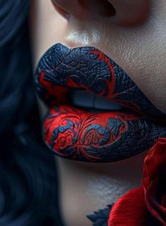 a woman's lips with red and black designs on them