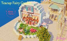 the teacup fairy garden is located in front of a building with flowers and trees