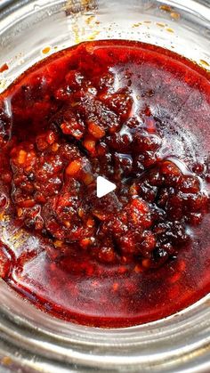 the sauce is red in color and it looks like chili