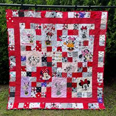 a quilt made to look like mickey and minnie mouse