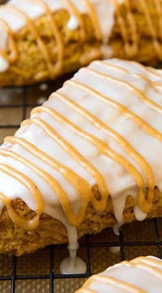 some kind of pastry with icing on top of the cooling rack in front of it