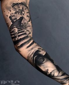 a man's arm covered in black and grey ink with a clock on it