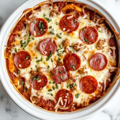 a pepperoni pizza sitting on top of a white plate