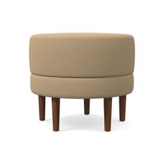 an upholstered footstool with wooden legs on a white background in the style of mid century modern furniture