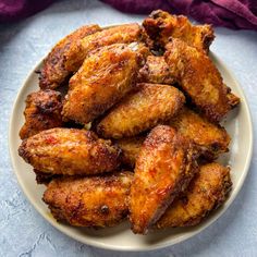 fried chicken wings on a white plate