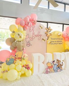 winnie the pooh baby shower decoration with balloons