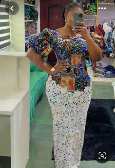 here is our Well turned out Ankara mixture.Made for all event. This dress is made with 100% cotton African print. The dress is made to order so customisation is welcome.We can add or remove anything you wish. You are welcome to request a change of fabrics as well.We have lots of fabric options available. If you have any question please do feel free to start a chat. Thank you for visiting our store. Multicolor Short Sleeve Wedding Dress, Traditional Fitted Midi Dress For Party, Traditional Knee-length Party Dresses, Multicolor Midi Dress For Wedding, Multicolor Midi Wedding Dress, White Maxi Dress For Festive Occasions, Festive Fitted Knee-length Midi Dress, White Festive Maxi Dress, White Fitted Midi Gown