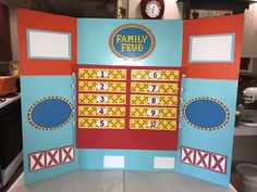 the family feed booth is set up with numbers and symbols on it's sides