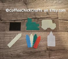 several pieces of crafting material are arranged on a wooden surface with the words coffee chick crafts on etsy com