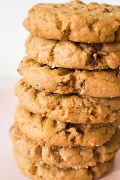 a stack of cookies sitting on top of a white plate