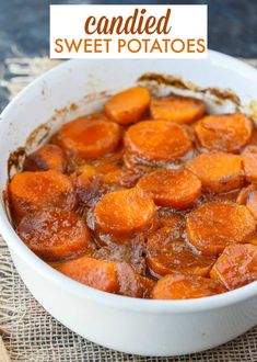 a white bowl filled with sweet potatoes on top of a table