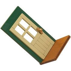 a wooden toy house with a door and window