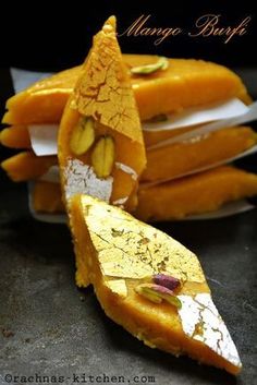 mango barka with almonds and pistachio seeds on it, ready to be eaten