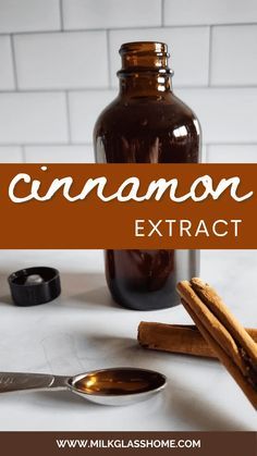 cinnamon spice next to an empty bottle and spoon on a white counter with the words cinnamon extract