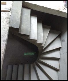 an image of a spiral staircase made out of concrete