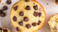 several chocolate chip muffins on a white surface