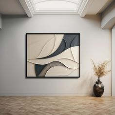 an abstract painting hangs on the wall next to a vase with dried grass in it