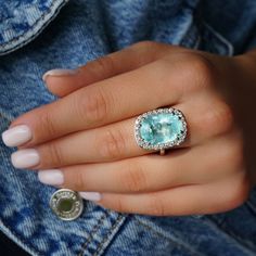 A Breathtakingly Striking HANDMADE 14k White Gold Ring with Beautiful Cushion Cut Paraiba Tourmaline in Green-Blue color! The GEM is 16.03 CT and measures 17.89x12.56x9.18 mm! This Stone will take your breath away, especially on the sunlight! You will want to look at this stone endlessly. The mounting is a masterpiece! HANDMADE 14K White Gold Diamond Mounting (tested), that was is custom made to Accommodate this Beauty of a Gem in a V-prongs setting! Super FINE Workmanship on the Diamond v-split setting with 26 pcs Brilliant Full Cut Diamonds in GH color, SI clarity, totaling to approx  0.97ct! Fabulous Braided Band and Diamond Gallery! The Entire Top's outline is 22.9x17.6mm- HUGE. The Ring weights 12.5 g, nice and SOLID. Sits 12.4 mm off the top of the finger. Finger size 8 (Free Re-sizi Gia Certified Aquamarine Jewelry For Formal Occasions, Gia Certified Oval Aquamarine Jewelry, Formal Gia Certified Aquamarine Jewelry, Gia Certified Aquamarine Jewelry Ring, Gia Certified Aquamarine Ring, Gia Certified Green Sapphire Jewelry, Cushion Cut Aquamarine Gemstone Jewelry, Gia Certified Oval Topaz Ring For Gift, Gia Certified Oval Topaz Ring As Gift