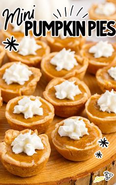 mini pumpkin pies on a wooden platter with whipped cream in the middle and text overlay