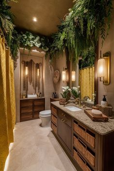 a bathroom with two sinks and plants on the wall above it, along with a toilet