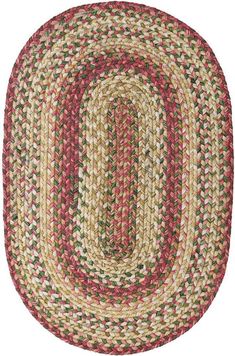 the oval rug is red, yellow and green with a braided design on it