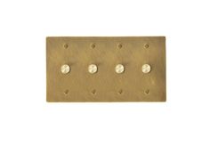 an antique brass plate with four screws and three holes in the middle, on a white background