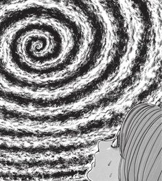 a woman looking at a spiral design in the sky with her head tilted to the side