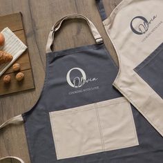 an apron that is sitting on the floor next to doughnuts and other items