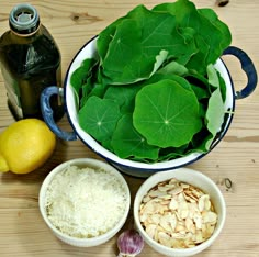 the ingredients for this dish include spinach leaves, almonds, and lemon juice