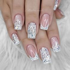 Dive into ocean-inspired white glitter French tip nails. Our blog post explores how to achieve this tranquil look on almond, square, or oval nails. Whether you're going for short and simple or long and dramatic, find out how to use a milky white base, add a wave of pink, and finish with silver design bling for a manicure that’s as serene as the sea. Coffin New Years Nails Sparkle, Christmas And New Year Nails Glitter, Summer Wedding Guest Nails Ideas, French Bling Nails, Bachelorette Nails The Bride, Bachelorette Nail Ideas, Vacation Nails Coffin, Mylar Nails, 21st Birthday Nails