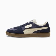 Back in an array of vivid colour schemes, the PUMA Super Team is modeled on the 1982 Handball World Championship trainer worn by the German national team. The original Super Team was crafted with a full suede upper, locking down the shoe’s classic styling. Originally a design feature to stand up to the rigors of the sport, contrast stitching in the midsole became one of the shoe’s most distinctive and standout features.. Visit our page to learn more about our navy PUMA Super Team Velvet Sneakers Best Shoes For Standing, Dark Sneakers, Dark Shoes, German National Team, Navy Blue Sneakers, Velvet Sneakers, Navy Blue Shoes, Navy Sneakers, Shoes Puma