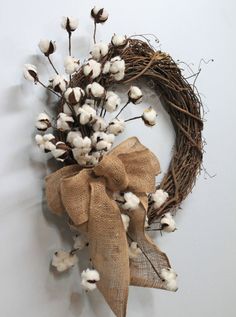 a wreath made out of burlock and cotton