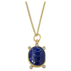 Carved Lapis Turtle Charm Amulet Pendant Necklace with Diamonds, 24kt Gold and Silver by Prehistoric Works of Istanbul, Turkey. Lapis - 10.90cts, Diamonds - 0.011cts. These pendants pair well alone or with other coin pendants or with miniature pendants. Measures 15mm x 21mm. Comes with 16" gold vermeil chain; 24kt Gold - 1.76 g; Sterling Silver - 0.94 g; Diamonds - 0.11 ct; Lapis - 10.90 ct To most tribes the turtle also represents healing, wisdom, spirituality, health, safety, longevity, protec Turtle Charm, 24kt Gold, Ancient Wisdom, Diamond Pendant Necklace, Coin Pendant, Gold Vermeil, Istanbul, Silver Gold, Jewelry Necklace Pendant