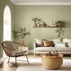 a living room with green walls and furniture