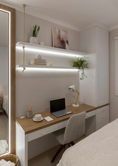 a bedroom with a bed, desk and mirror