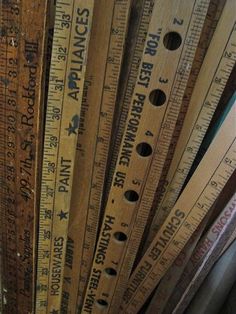 several rulers are stacked on top of each other