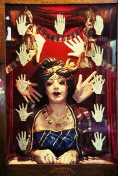 a display case with an image of a woman's hands and hand gestures in it