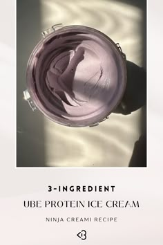 an ice cream container sitting on top of a white table next to a window with the words 3 - ingredient ube protein ice cream