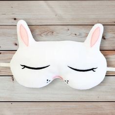 These adorable sleep masks are the perfect gift!! These sleep masks are 100% washable and made with a minky type material for extra softness. The headband piece is made from elastic. It is approximately 11 inches long and easily stretches to fit most sizes. Please advise if you need a different size. Care instructions: wash in garment bag on gentle cycle with cool water. Hang dry. Bunny Shape, Sleeping Eye Mask, Sleeping Bunny, Felt Mask, Sleep Masks, Garment Bag, Sleep Mask, 11 Inches, Birthday Party Themes