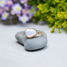 A stunning Australian Opal uniquely handcrafted by electroforming and set on an 14k Gold filled band.Whether to signify a blossoming Love, seal an eternal love or a special Friendship, this stunning Opal ring will be sure to make a unique engagement or wedding ring on that very special day! ❣This lovely rustic ring can also be offered on other special occasions such as a birthday, anniversary, Mother's Day, Christmas, or Valentine's Day.My rings are all custom-made to order using ethically sourc Australian Opal Ring, Rustic Ring, Rustic Rings, Natural Gemstone Ring, Raw Diamond, Unique Engagement, Opal Ring, Australian Opal, Eternal Love