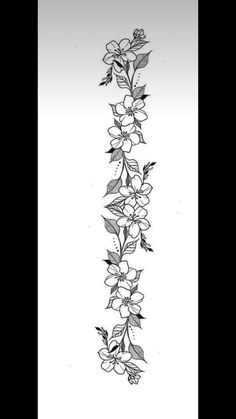 a black and white drawing of flowers on a wall