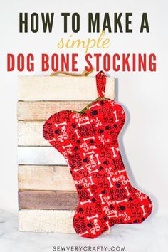 a dog bone christmas stocking hanging on a wooden crate with text overlay that reads learn to sew a dog bone christmas stocking