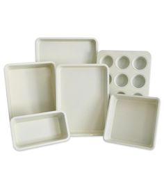 six white trays with holes in them