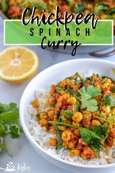 chickpea spinach curry in a white bowl with rice and cilantro