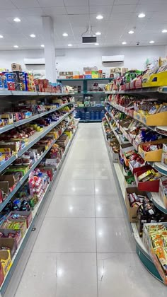 an aisle in a grocery store filled with lots of food