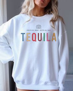 "The perfect chance to wear a Tequila Mexico Sweatshirt. This makes a great way to have soft cozy oversized girls trip travel sweatshirt. For anyone that adores: Tequila, Mexico Travel, Partying and Fiestas this is for you!  Gildan 18000 Sweatshirt  Unisex Adult Sizing  Listing includes: Sweatshirt Only  50% Cotton, 50% Polyester Made To Order:  This is a Direct-To-Garment item and the ink is printed into the fabric, which prevents cracking and peeling.  Size:  Photos include size charts with di Tequila Mexico, Mexico Party, Travel Sweatshirt, Acai Bowls, Tequila Shirt, Agave Plant, Moon Design, Bowls Recipe, Mexico Travel