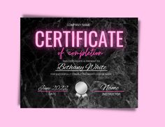 a black and white certificate with pink neon lights on the front, along with a marble background