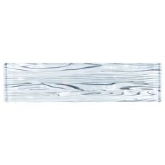 a white wooden plank with wavy lines on it